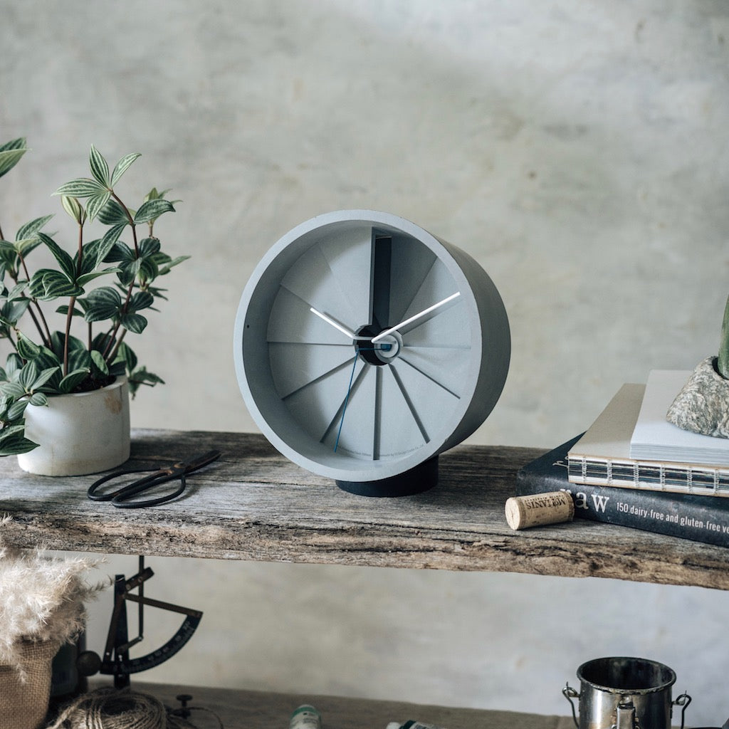 Wall Clock displayed on cozy shelves