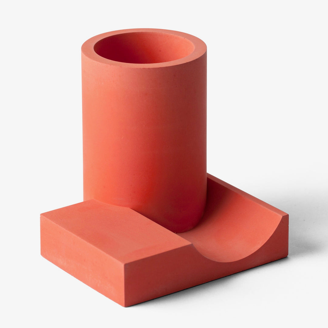 Red MERGE pen holder front view