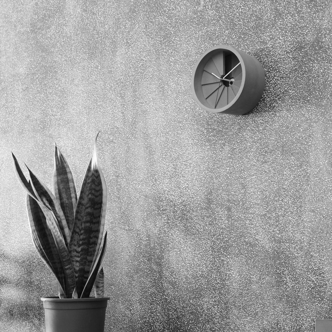 Concrete Wall Clock hanging on wall