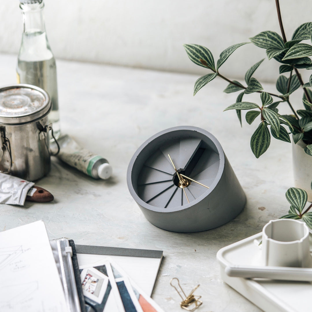 Table Clock being used on neatly cluttered desk