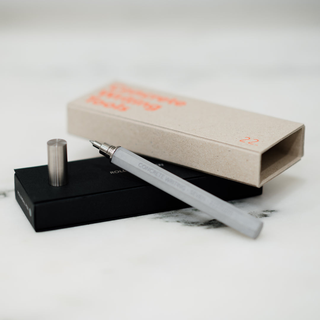 Seven Rollerball Pen by 22STUDIO Rested On Its Box