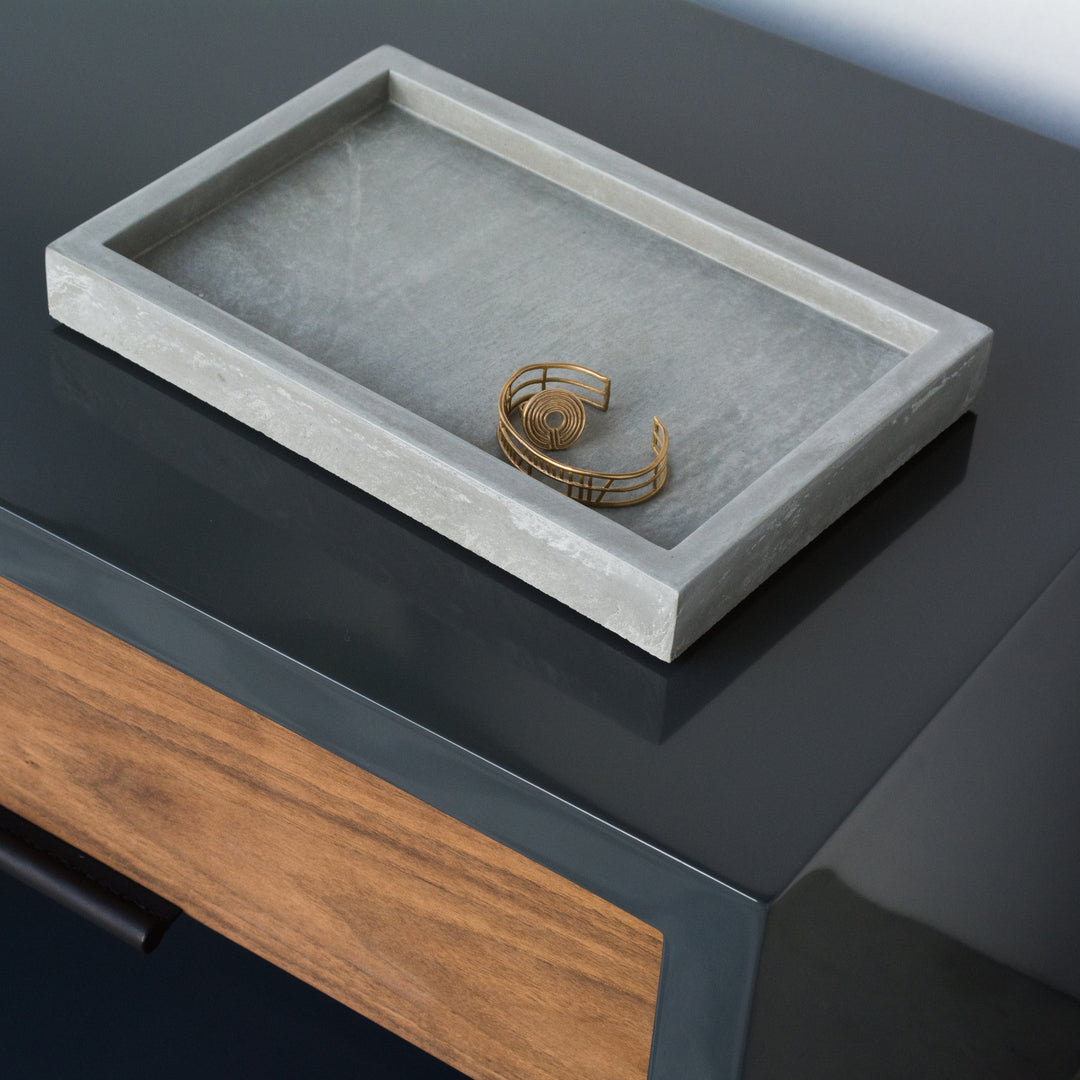 Isometric View of KOMOLAB Valet Tray (Concrete) with A Bracelet