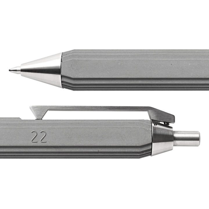 Detailed View of Two Ends of a Concrete and Metal Pen