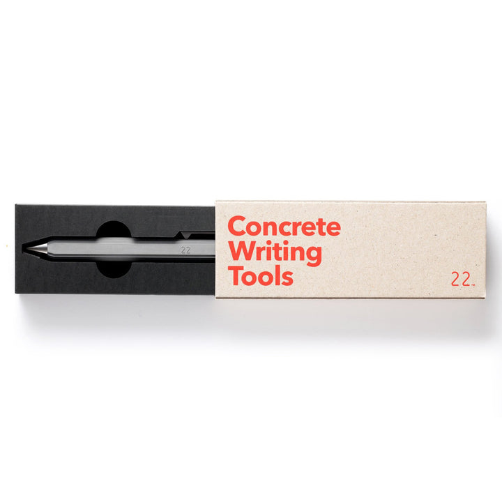 A Mineral Gray Concrete Pen by 22STUDIO  in its Packaging