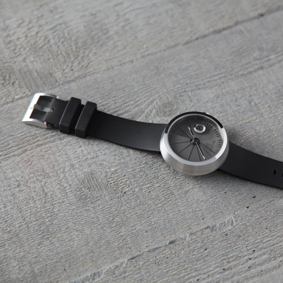 22STUDIO Concrete Watch With A Black Band And Silver Buckle