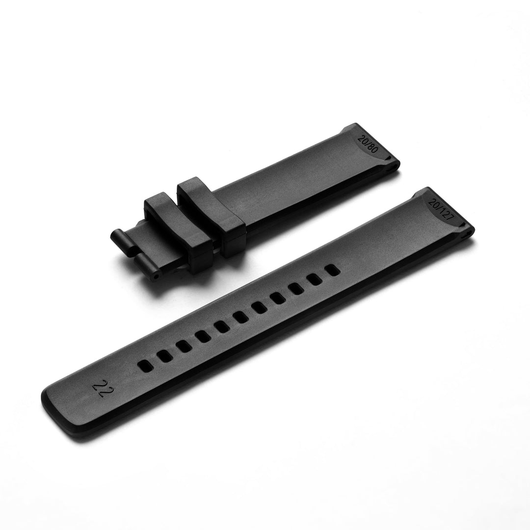 Two Ends Of A Black Fluoroelastomer Watch Band by 22STUDIO