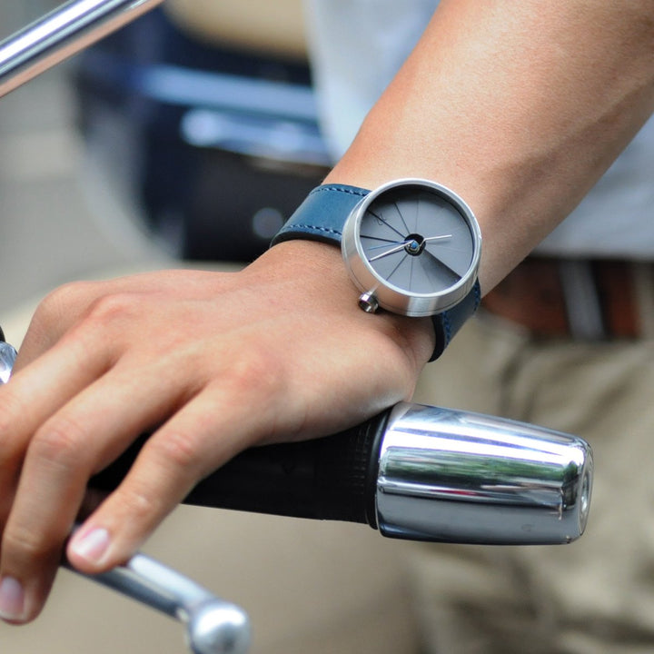 A Modern Concrete Watch By 22STUDIO On A Bikerider's Wrist