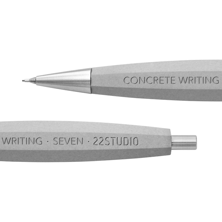 Front And Back Ends Of A 22STUDIO Seven Concrete Mechanical Pencil